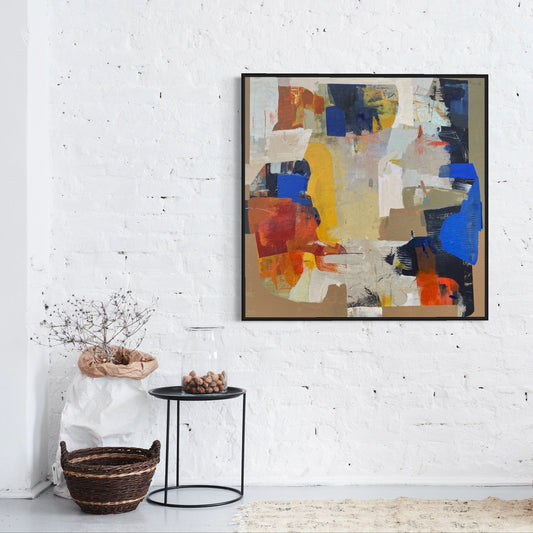 Abstract art piece on a white wall with minimal decor