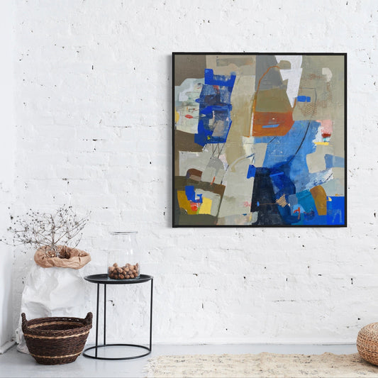 Abstract painting on a white wall with minimal decor