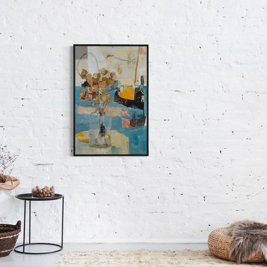 Framed abstract floral painting on a white brick wall with decorative items below.