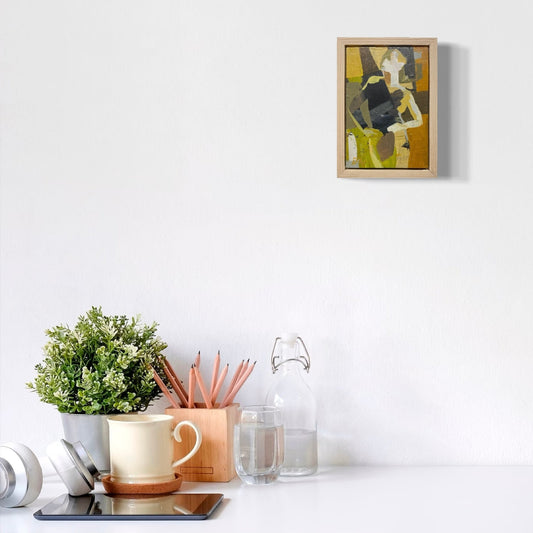 Decorative items on a white surface with a framed painting above